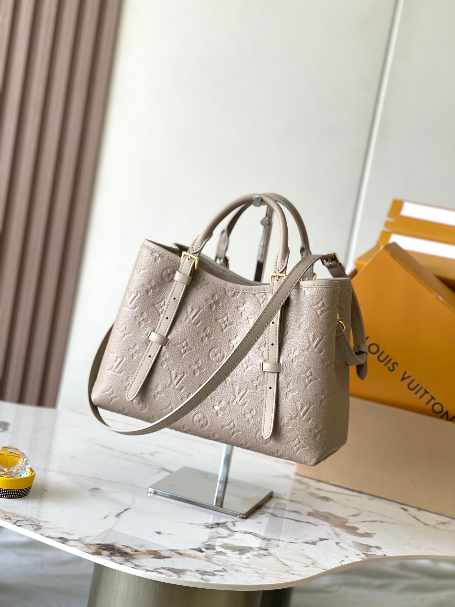 LOUIS VUITTON BABYLONE TOTE 31 IN TOURTERELLE MONOGRAM EMPREINTE LEATHER