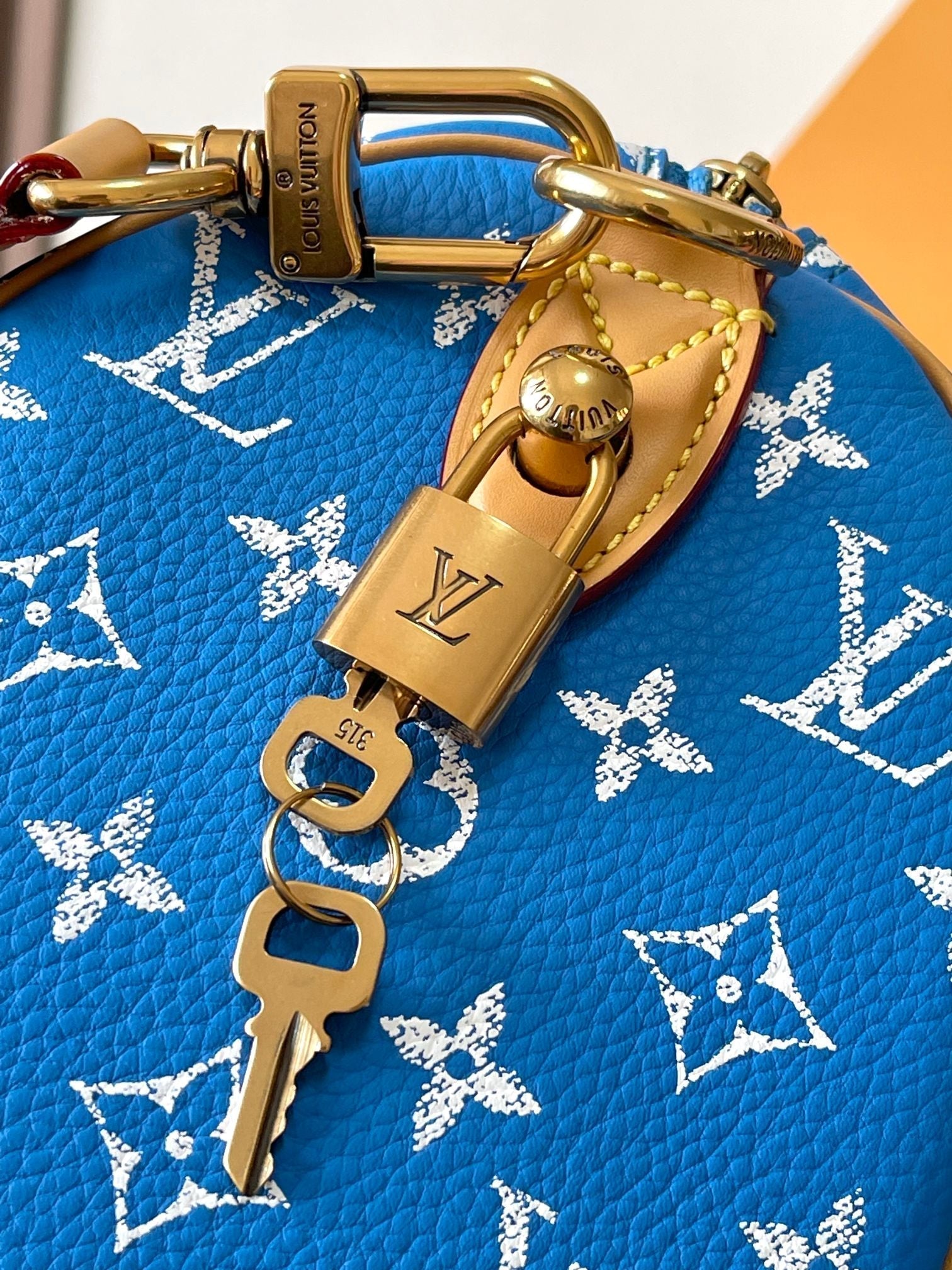 LOUIS VUITTON SPEEDY P9 BANDOULIÈRE 25 IN BLUE MONOGRAM CANVAS GOLD HARDWARE