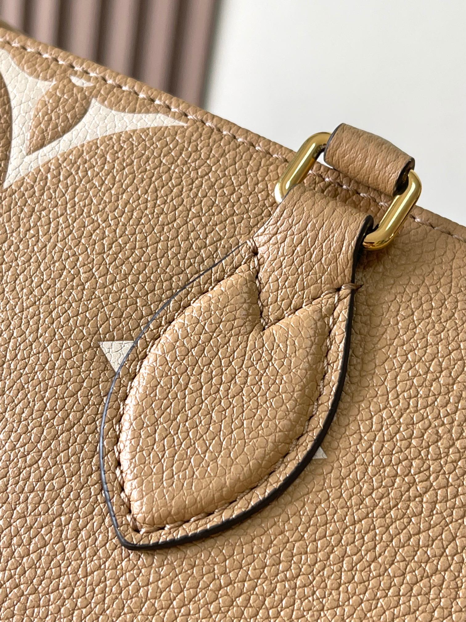 LOUIS VUITTON ONTHEGO PM 25 IN MILK TEA MONOGRAM IMPREINTE LEATHER