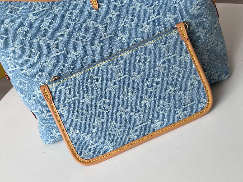 LOUIS VUITTON LV 25S CARRYALL 29 IN LIGHT BLUE DENIM MONOGRAM LEATHER TRIM