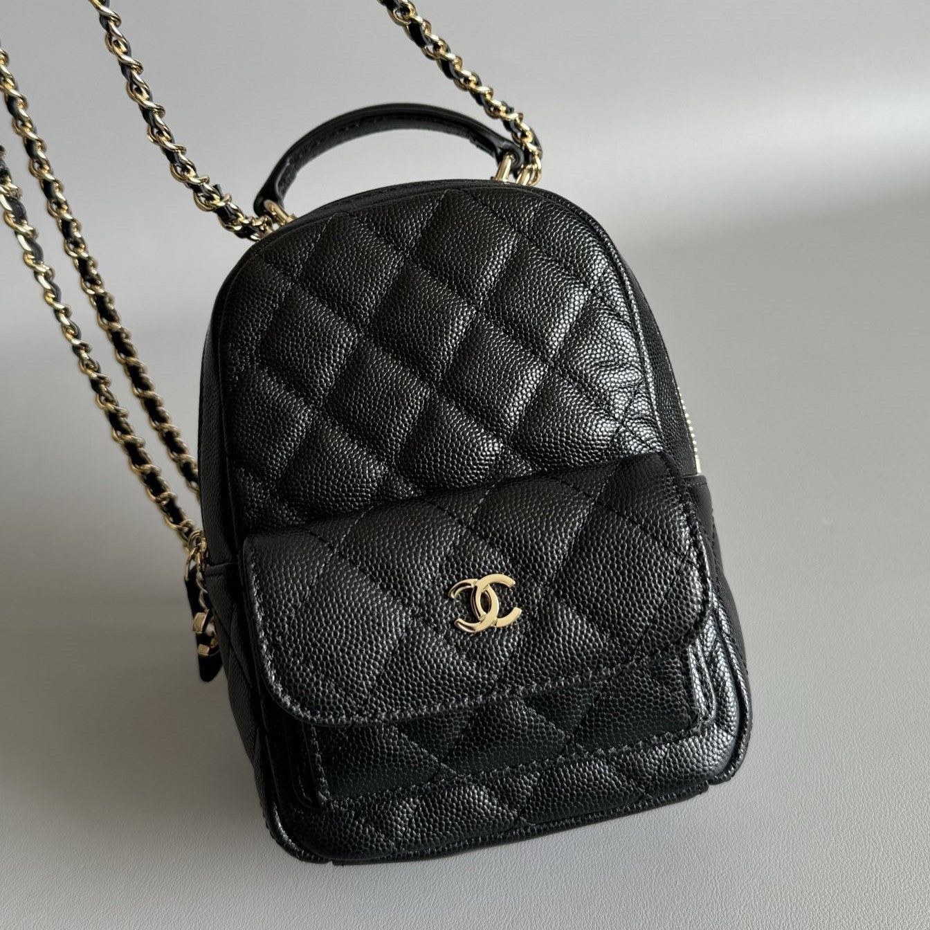 CHANEL MINI 18 BACKPACK BLACK CAVIAR LIGHT GOLD HARDWARE