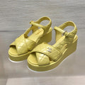 CHANEL WEDGE SANDALS IN YELLOW CREAM CALFSKIN
