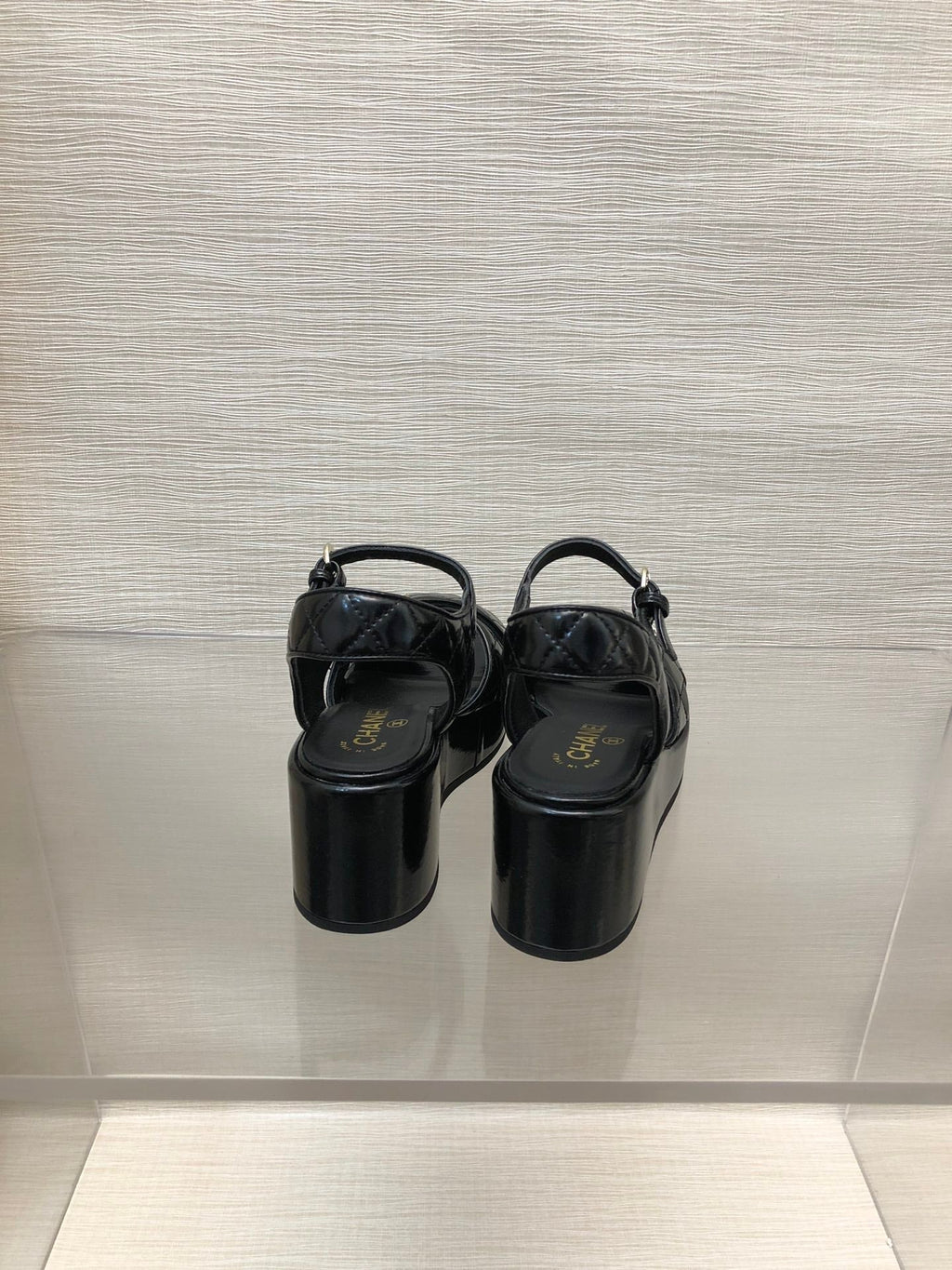 CHANEL WEDGE SANDALS IN BLACK CALFSKIN