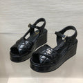 CHANEL WEDGE SANDALS IN BLACK CALFSKIN
