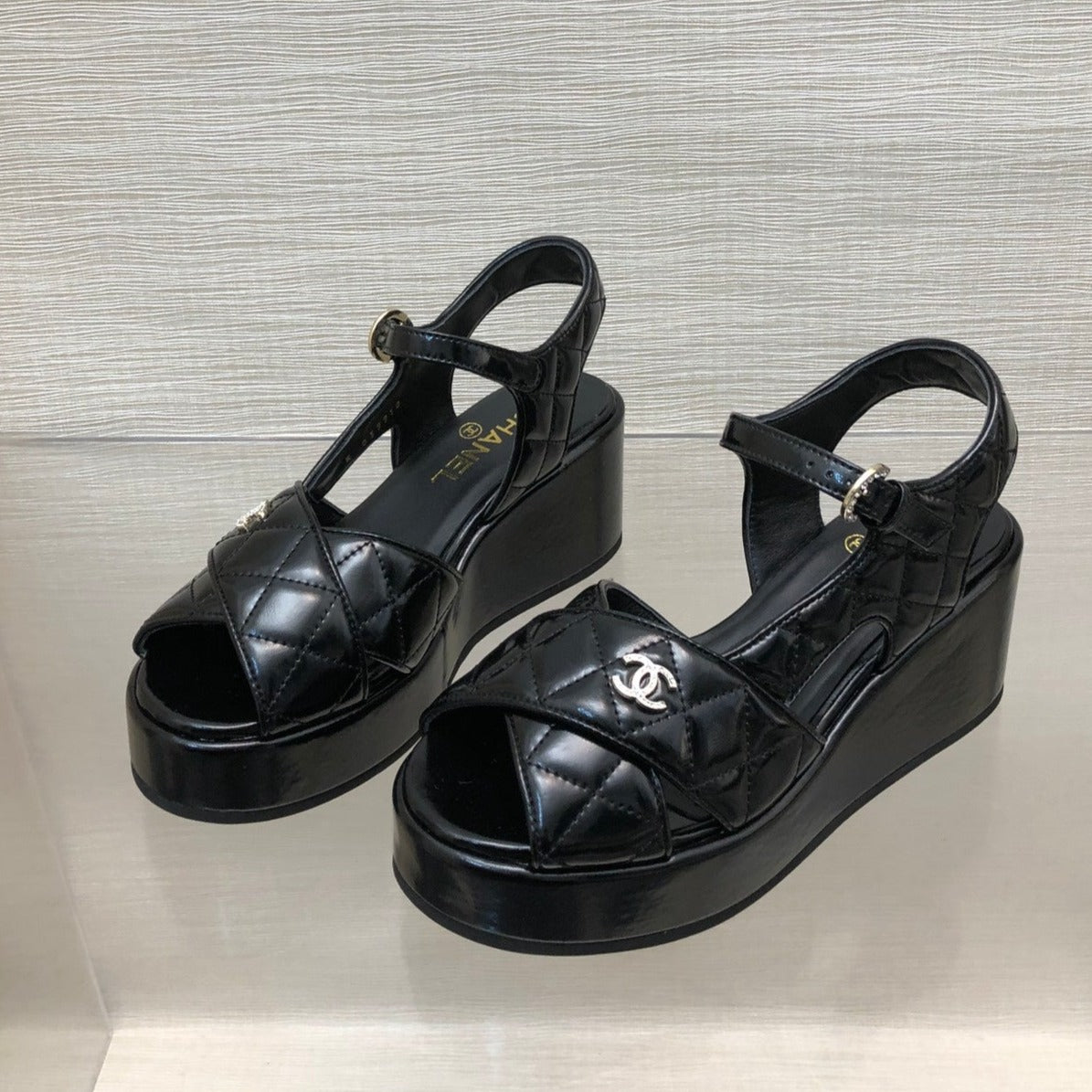 CHANEL WEDGE SANDALS IN BLACK CALFSKIN