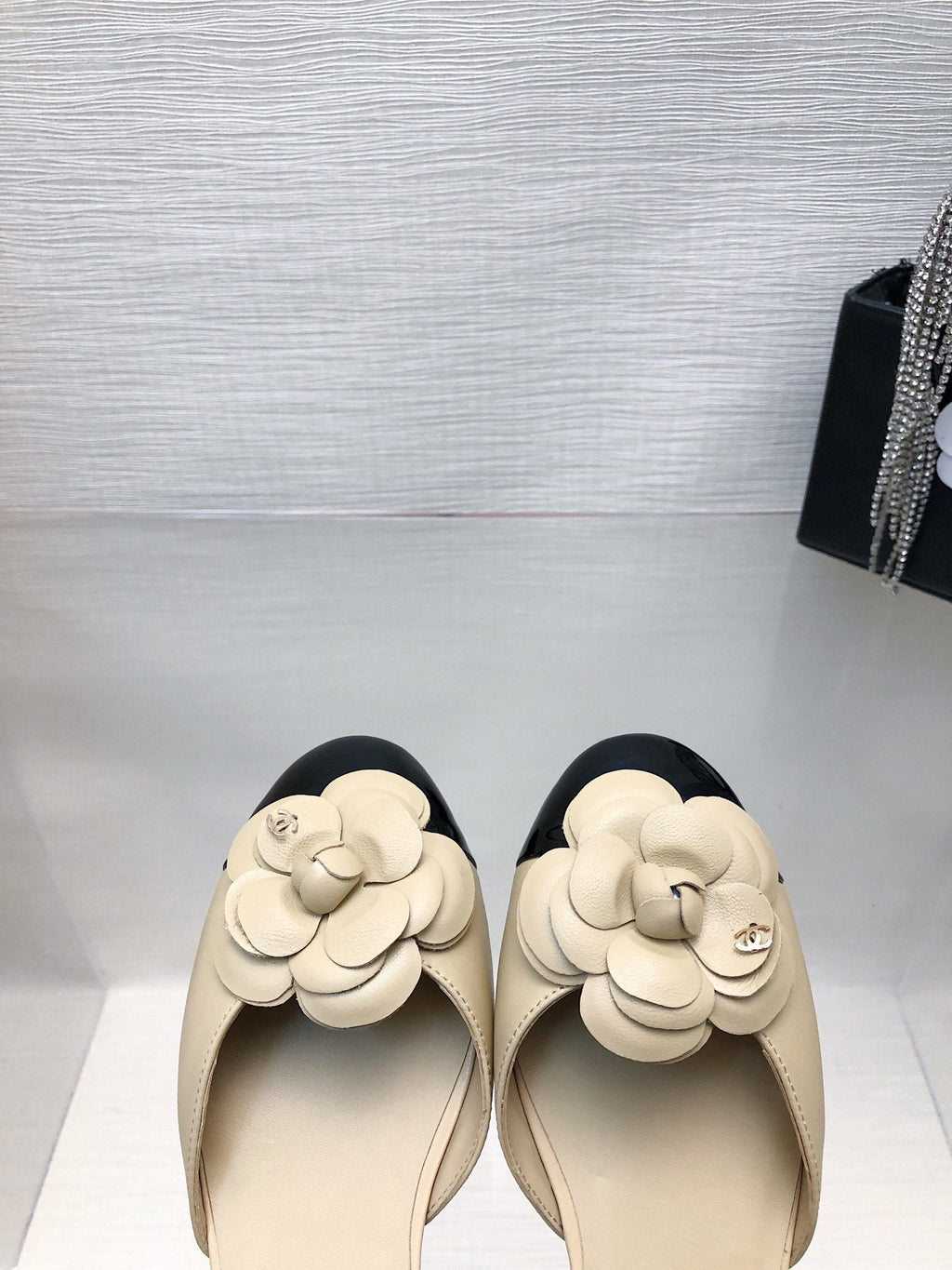 CHANEL BEIGE MIX BLACK LAMBSKIN CAMELLIA HOLLOW SANDAL