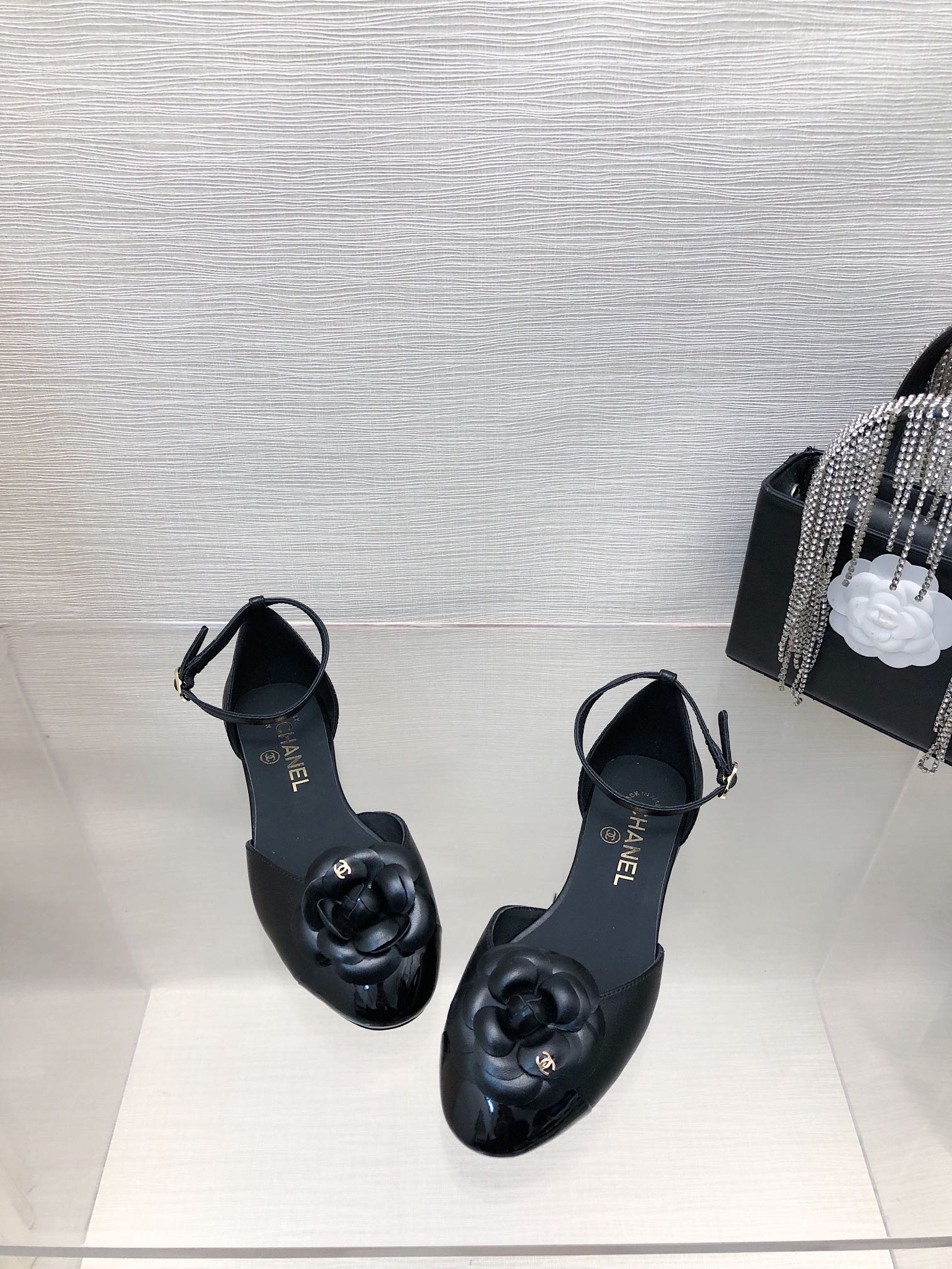 CHANEL BLACK LAMBSKIN CAMELLIA HOLLOW SANDAL