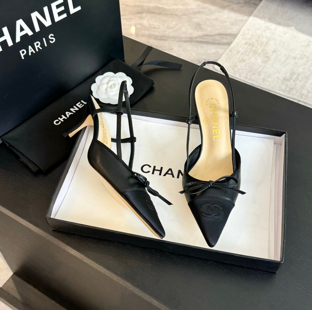 CHANEL SLINGBACK WITH BOW IN BLACK LAMBSKIN
