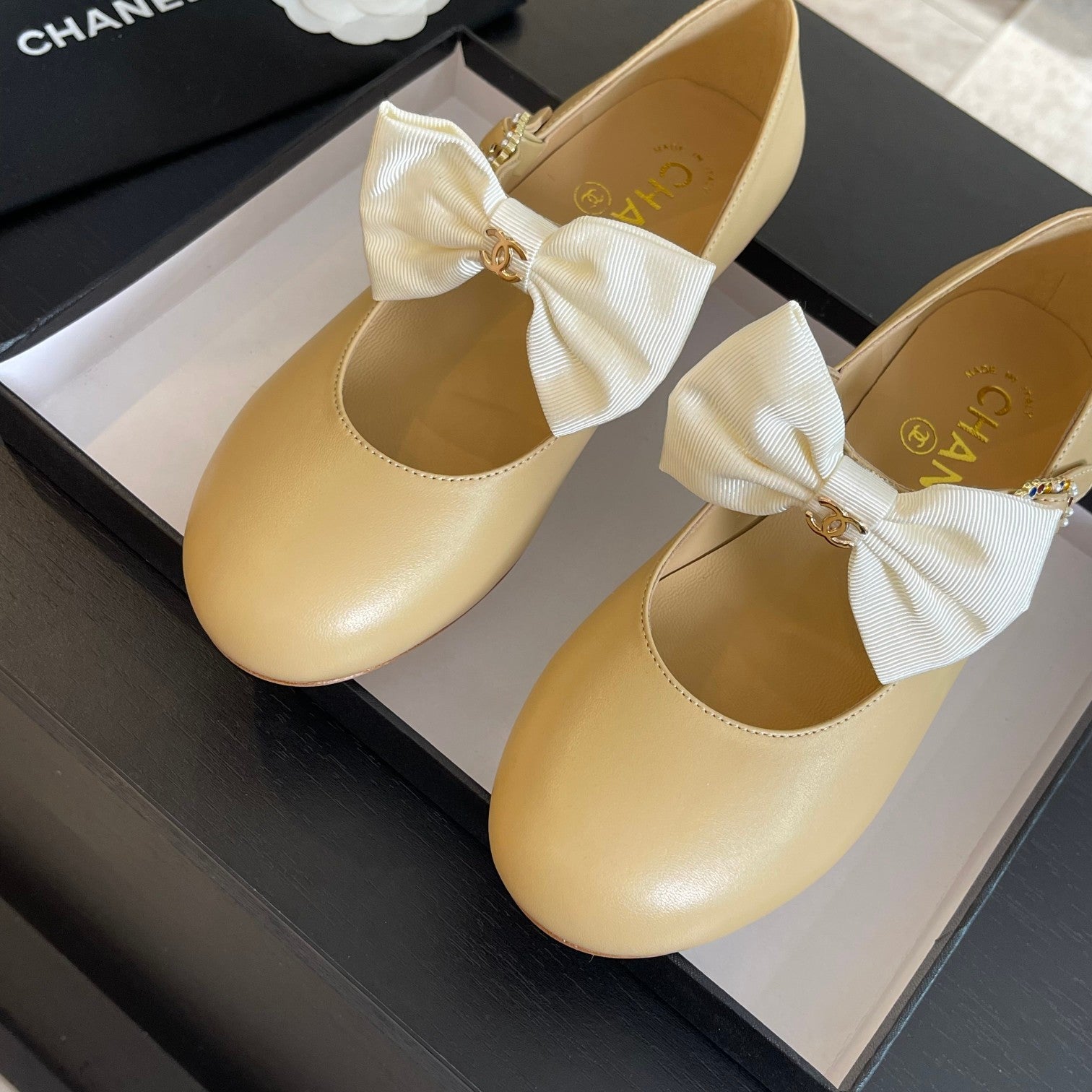 CHANEL BALLET FLAT DARK CREAM LAMBSKIN WITH WHITE BOW
