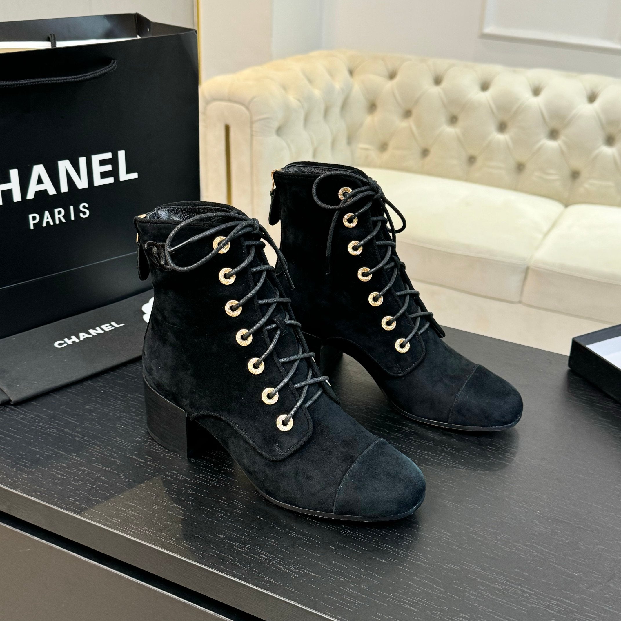 CHANEL LACE-UP SHORT BOOTS IN BLACK SUEDE