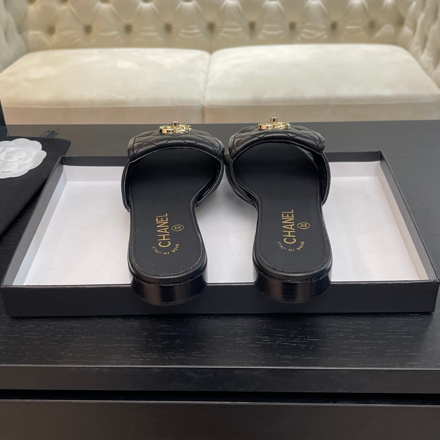 CHANEL FLAT MULE IN BLACK LAMBSKIN