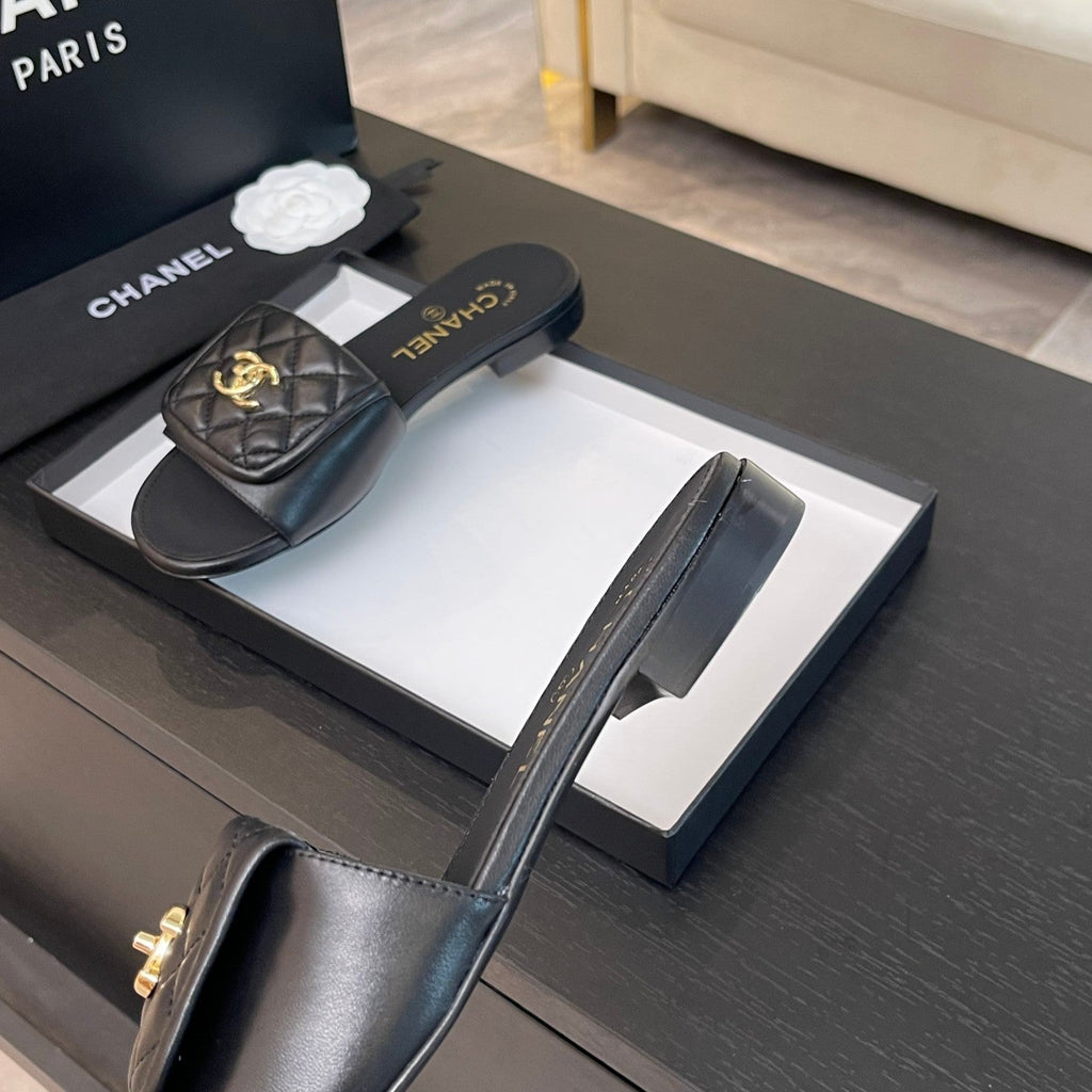 CHANEL FLAT MULE IN BLACK LAMBSKIN