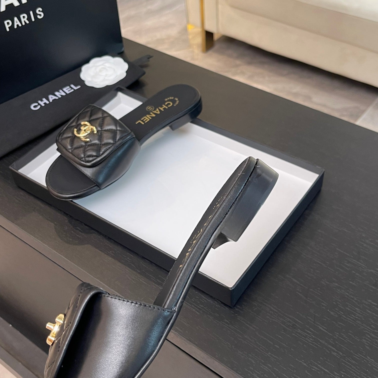 CHANEL FLAT MULE IN BLACK LAMBSKIN