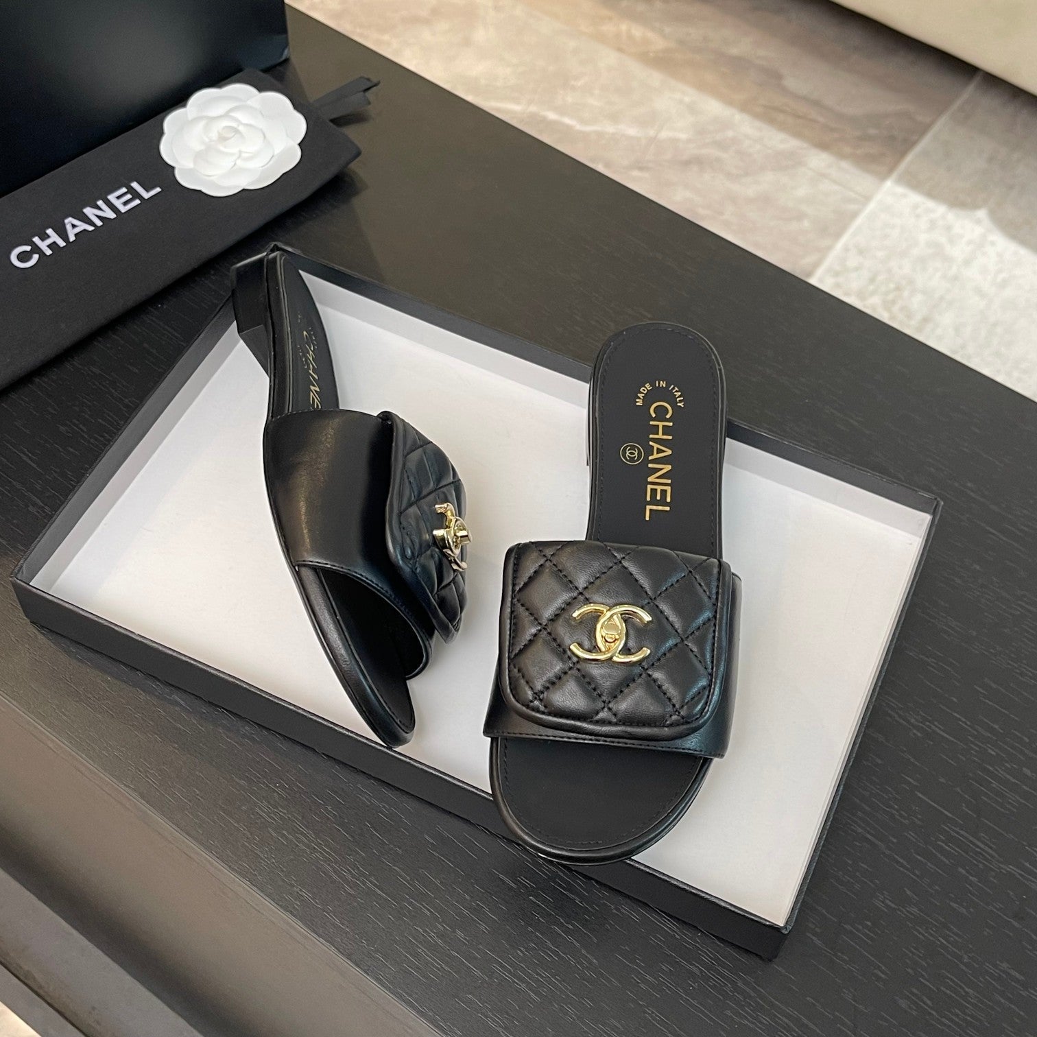 CHANEL FLAT MULE IN BLACK LAMBSKIN