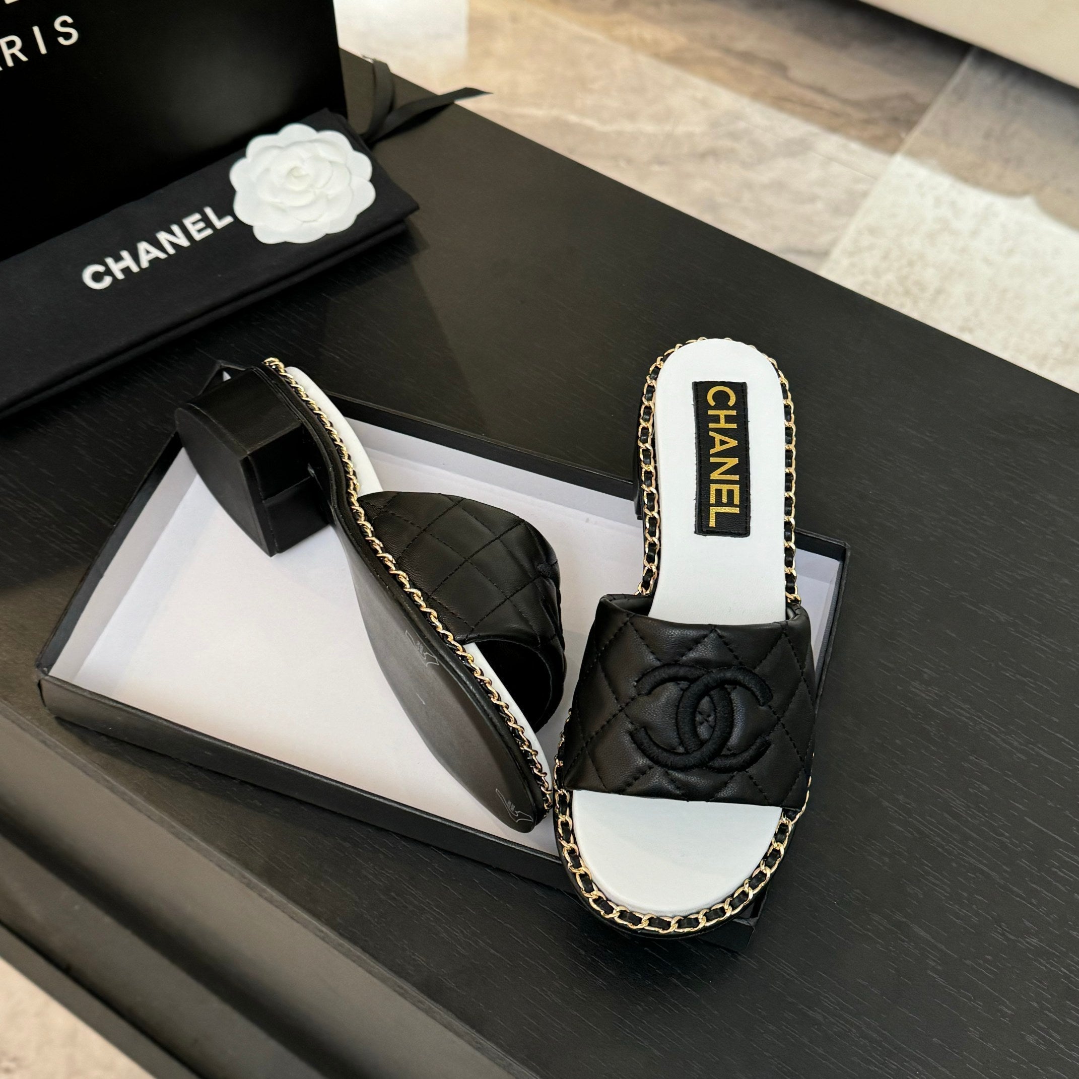 CHANEL HIGH FLATFORM SLIPPER IN BLACK EMBOSSED SHEEPSKIN
