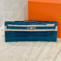 HERMES KELLY CUT 31 IN CLASSIC BLUE SHINNY ALLIGATOR LEATHER WITH SILVER HARDWARE