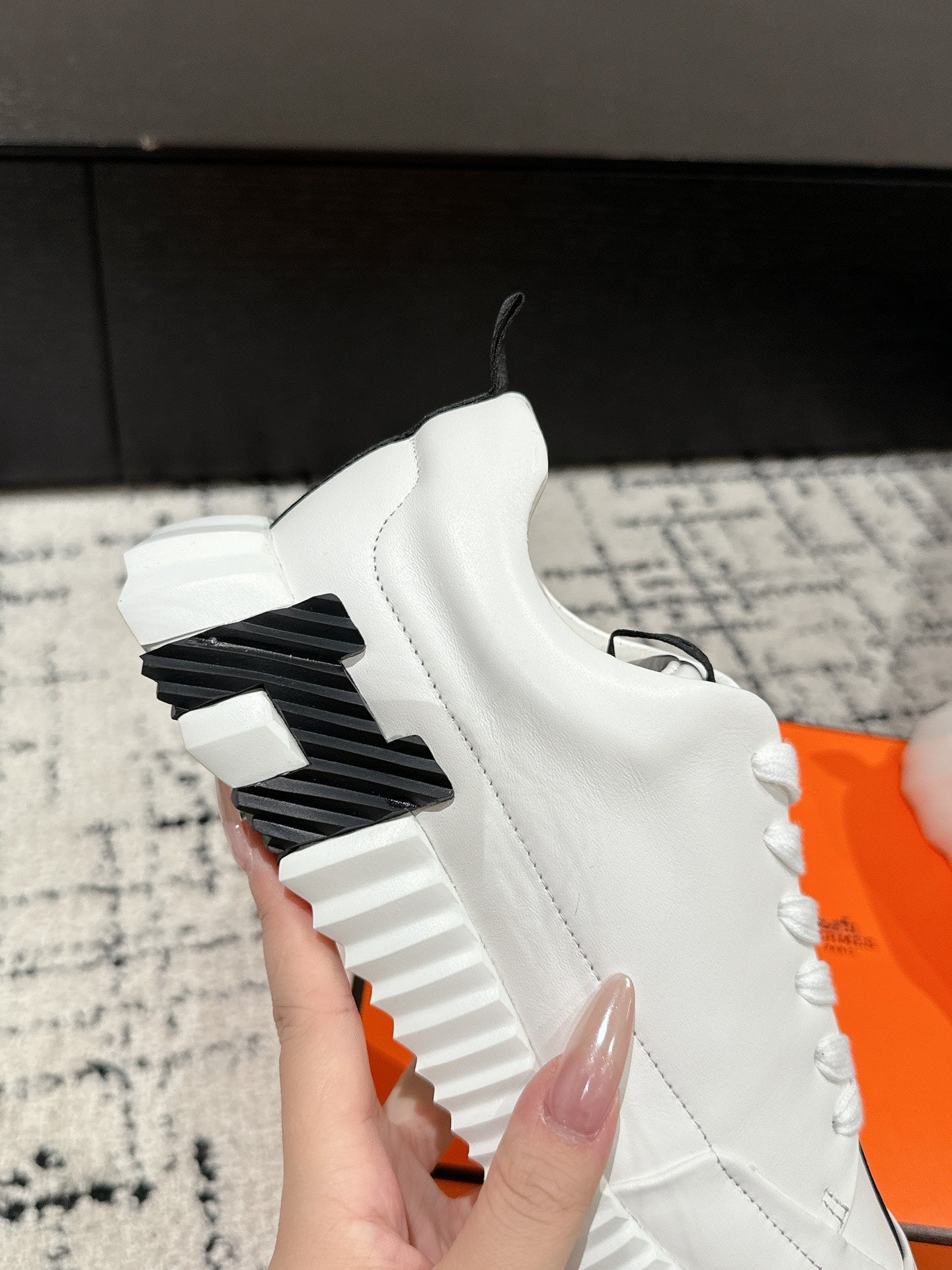 HERMES BOUNCING SNEAKER IN WHITE MIX BLACK CALFSKIN