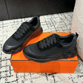 HERMES BOUNCING SNEAKER IN BLACK CALFSKIN AND FABRIC