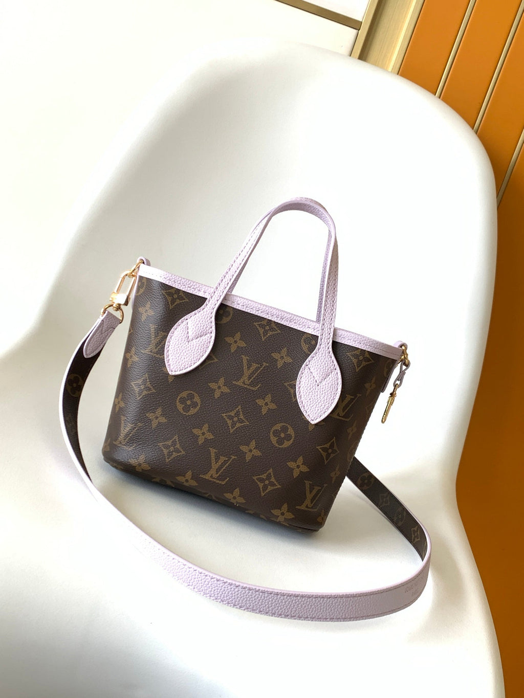 LOUIS VUITTON LV 25S NEVERFULL BANDOULIÈRE INSIDE OUT BB 31 IN LIGHT PURPLE AND BROWN CALFSKIN