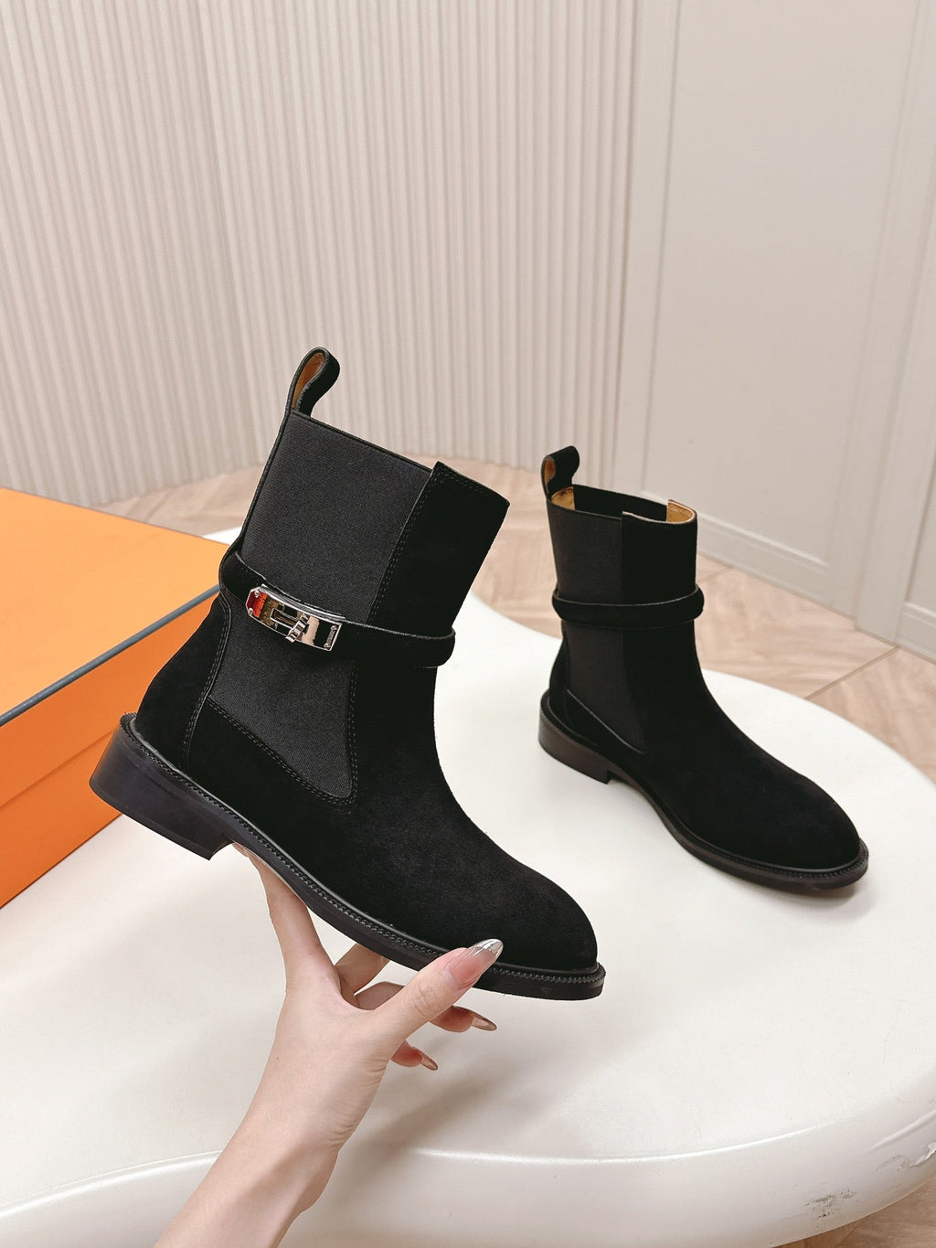 HERMES KELLY BUCKLE SHORT BOOTS IN BLACK SUEDE