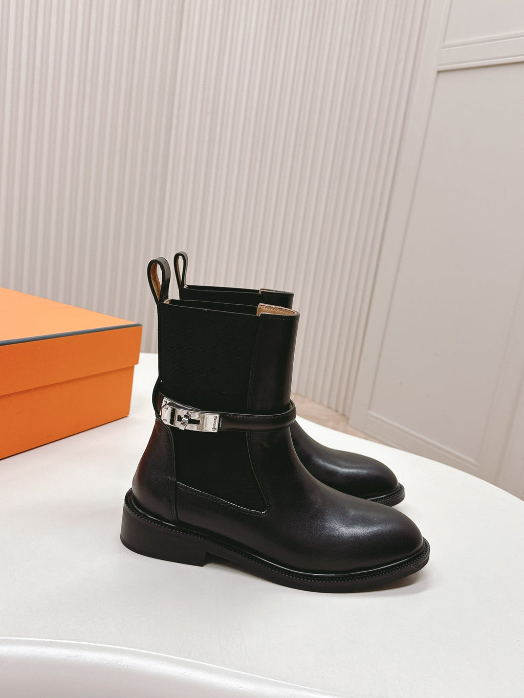 HERMES KELLY BUCKLE SHORT BOOTS IN BLACK CALFSKIN
