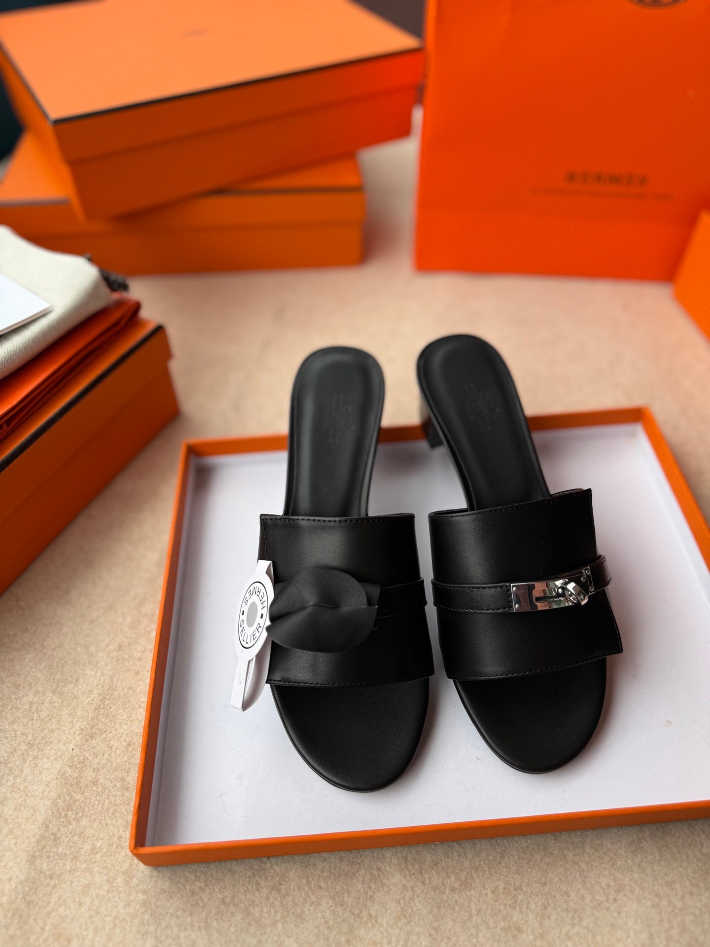 HERMES HIGH MULES IN BLACK CALFSKIN