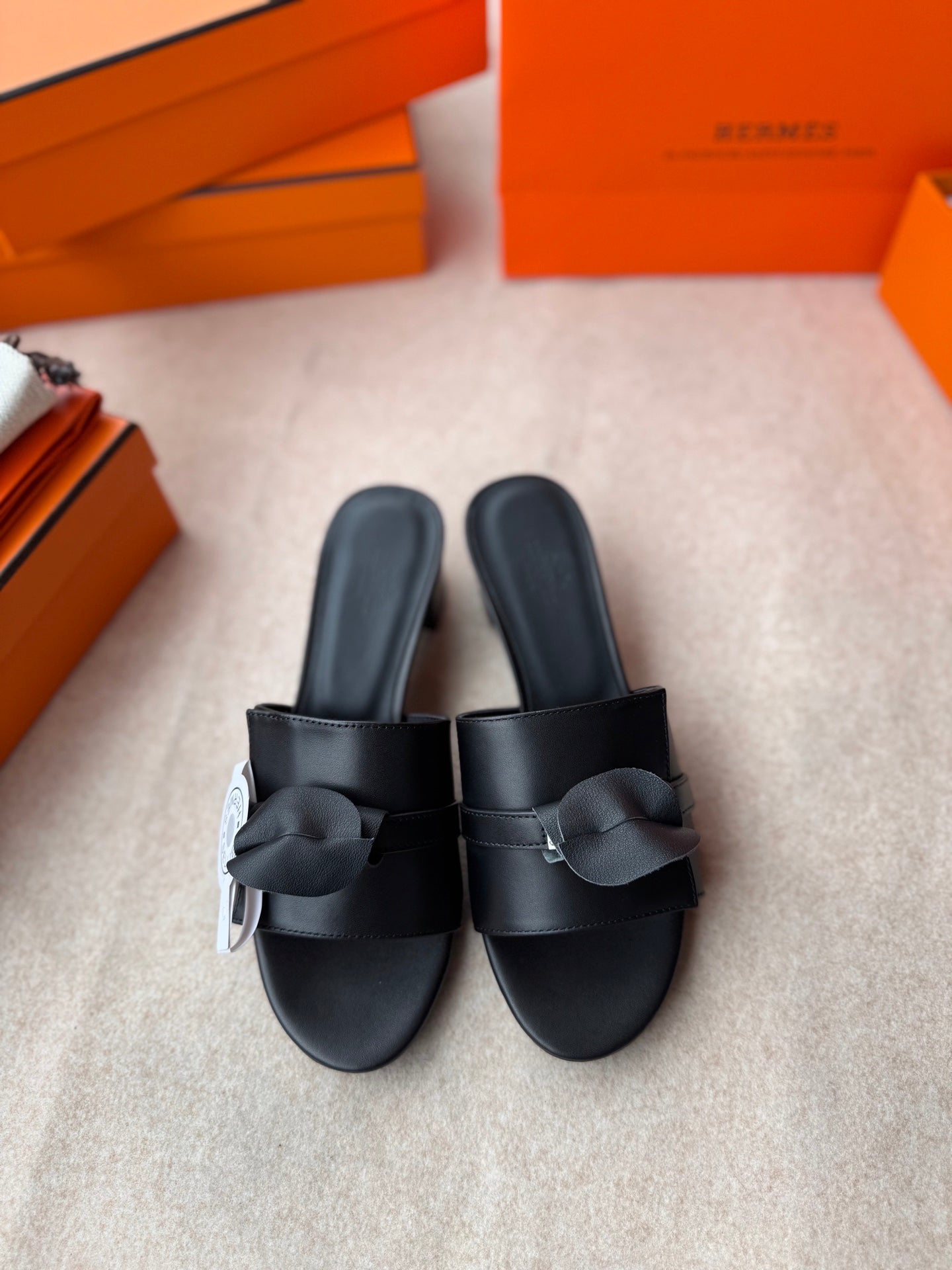 HERMES HIGH MULES IN BLACK CALFSKIN
