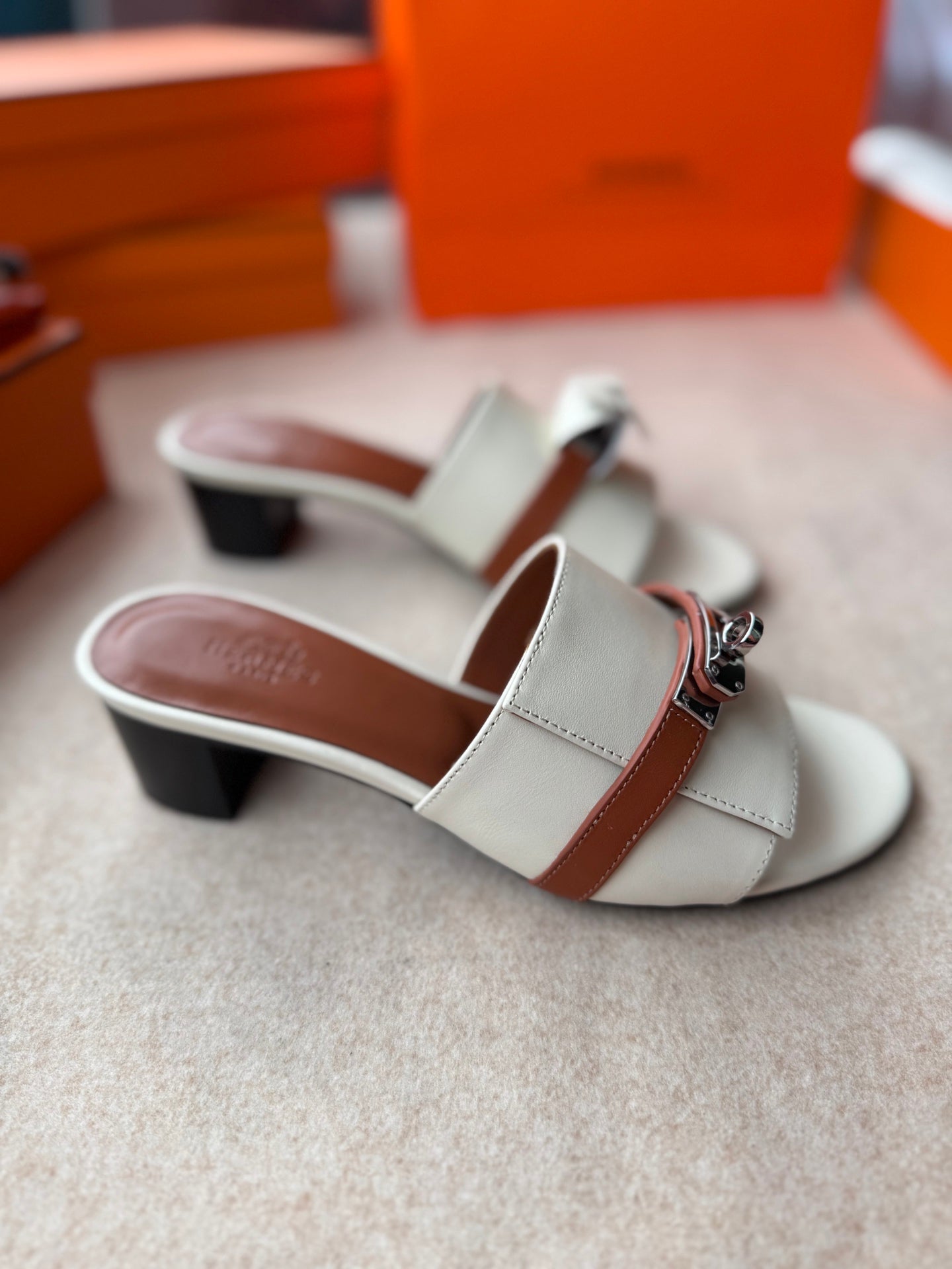 HERMES HIGH MULES IN WHITE CALFSKIN