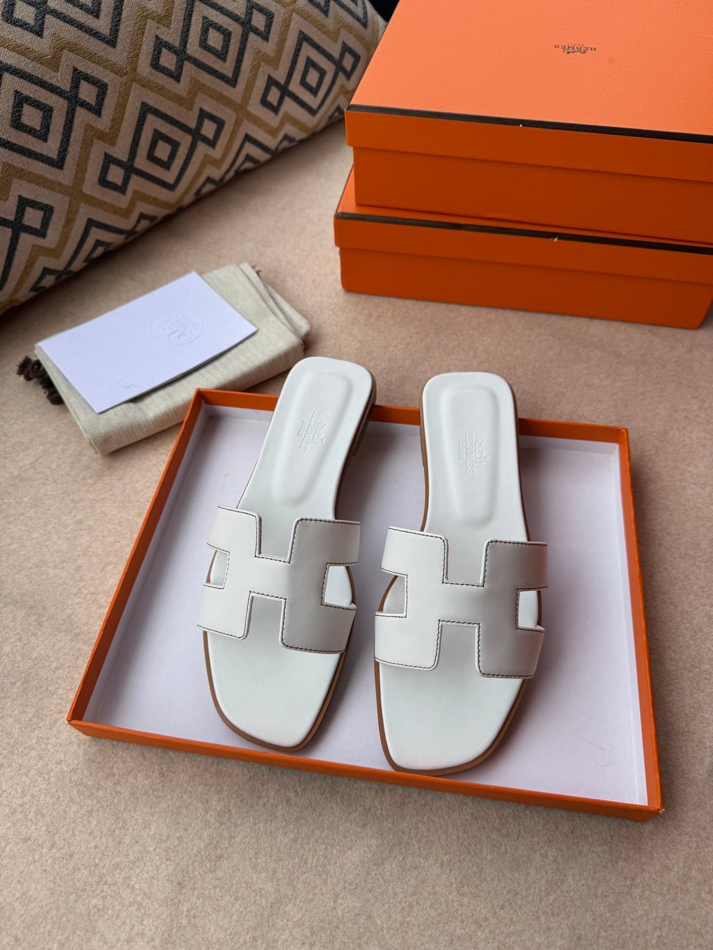HERMES 0RAN SANDALS IN WHITE CALFSKIN