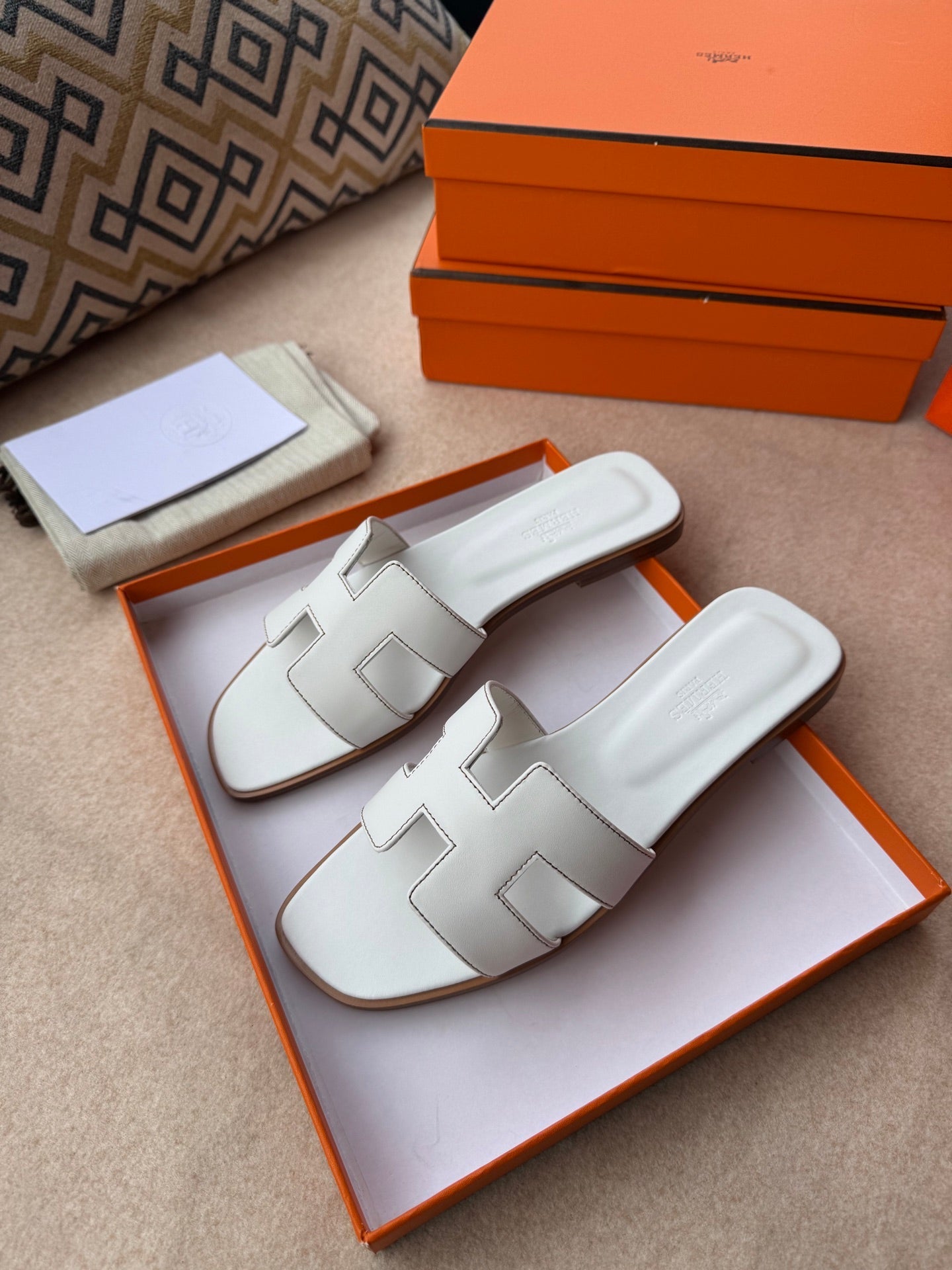HERMES 0RAN SANDALS IN WHITE CALFSKIN