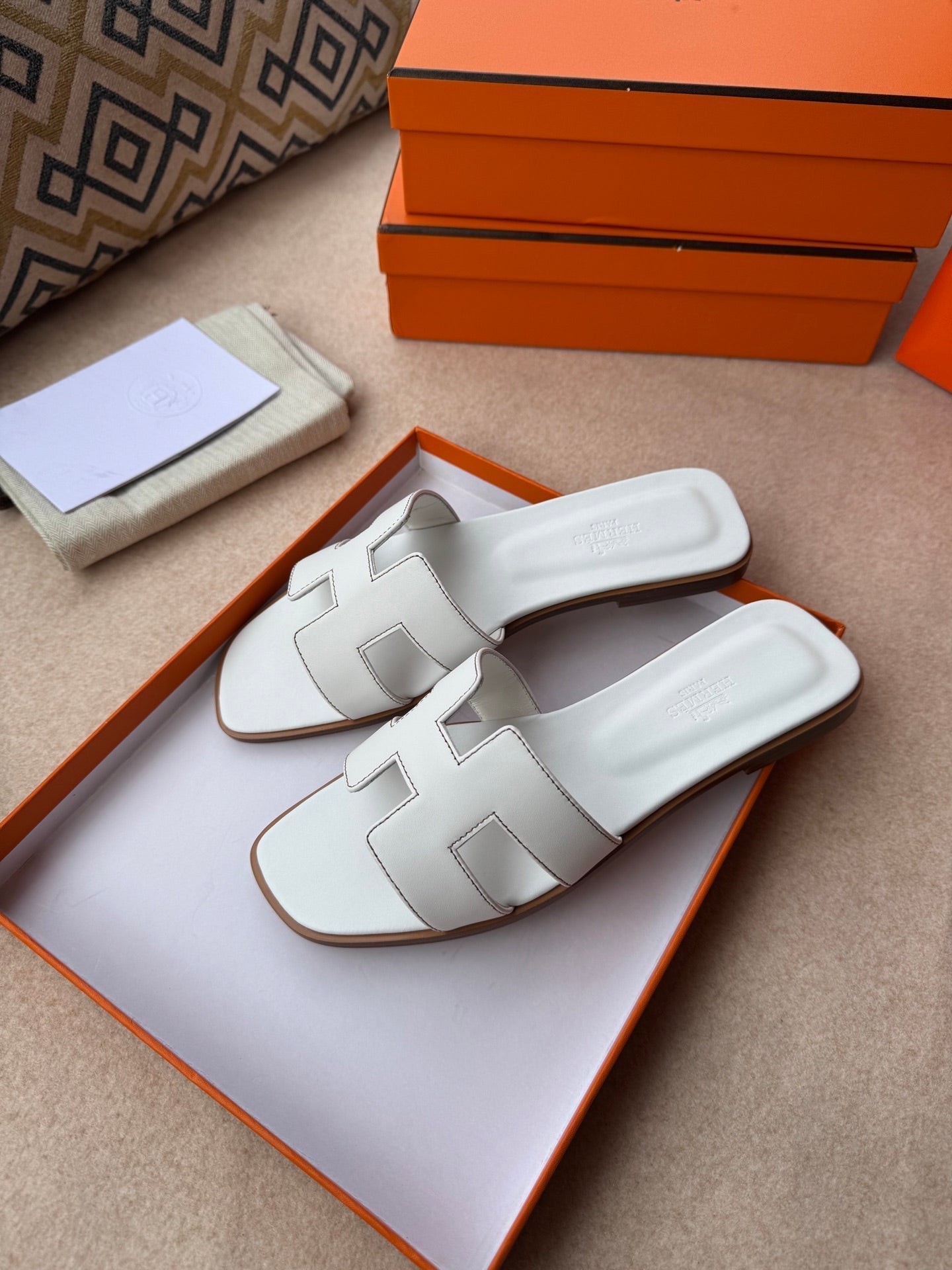 HERMES 0RAN SANDALS IN WHITE CALFSKIN