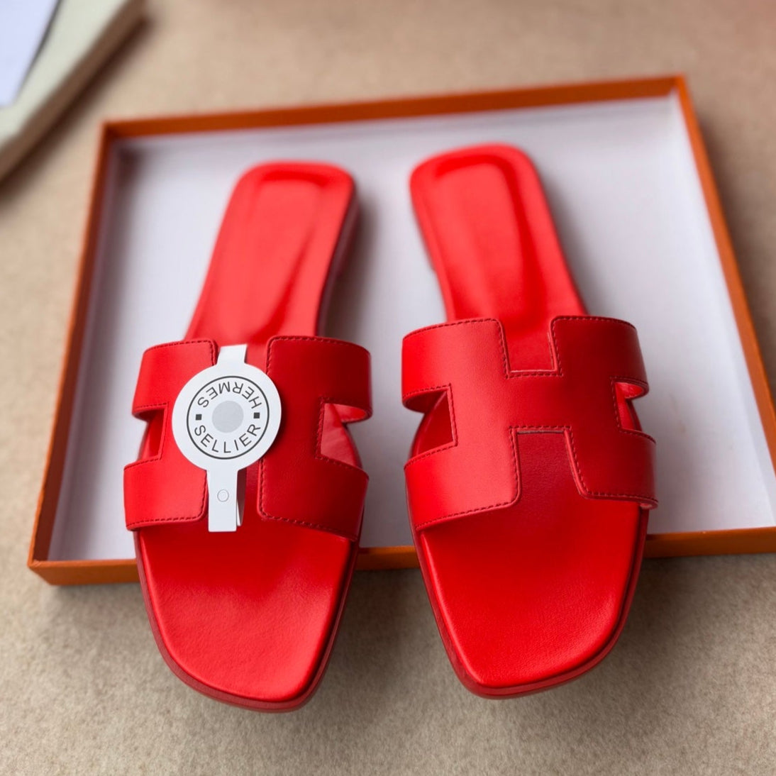 HERMES 0RAN SANDALS IN CHERRY RED CALFSKIN