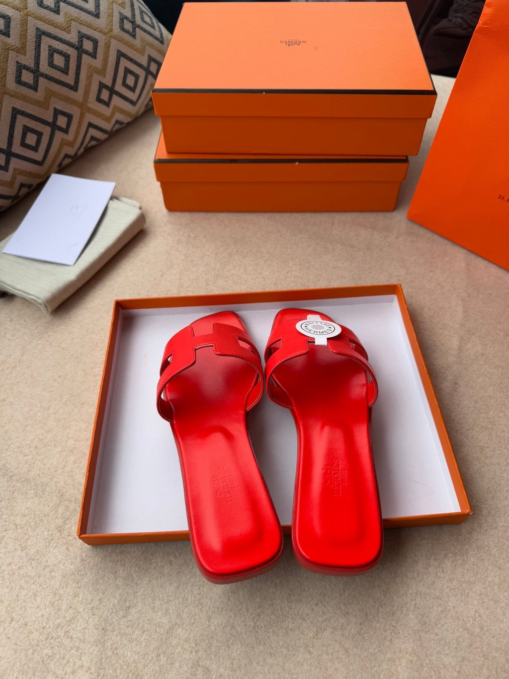 HERMES 0RAN SANDALS IN CHERRY RED CALFSKIN