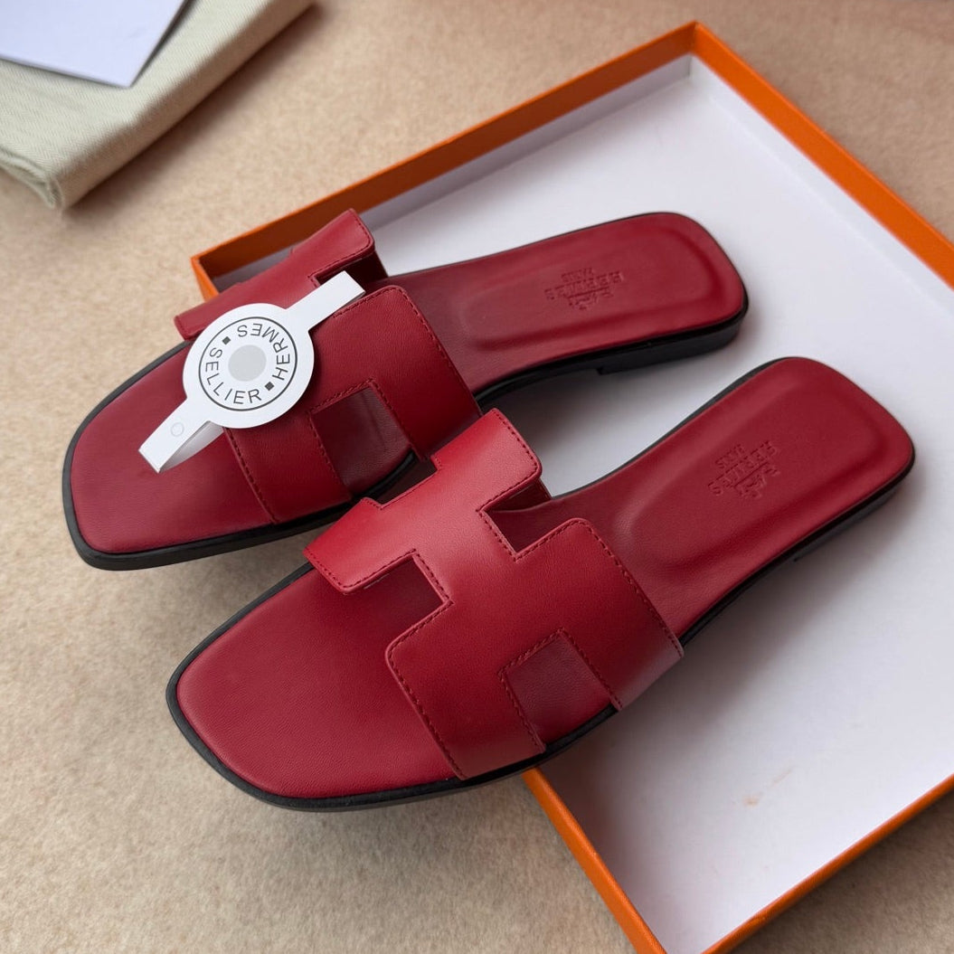 HERMES 0RAN SANDALS IN JAM RED CALFSKIN