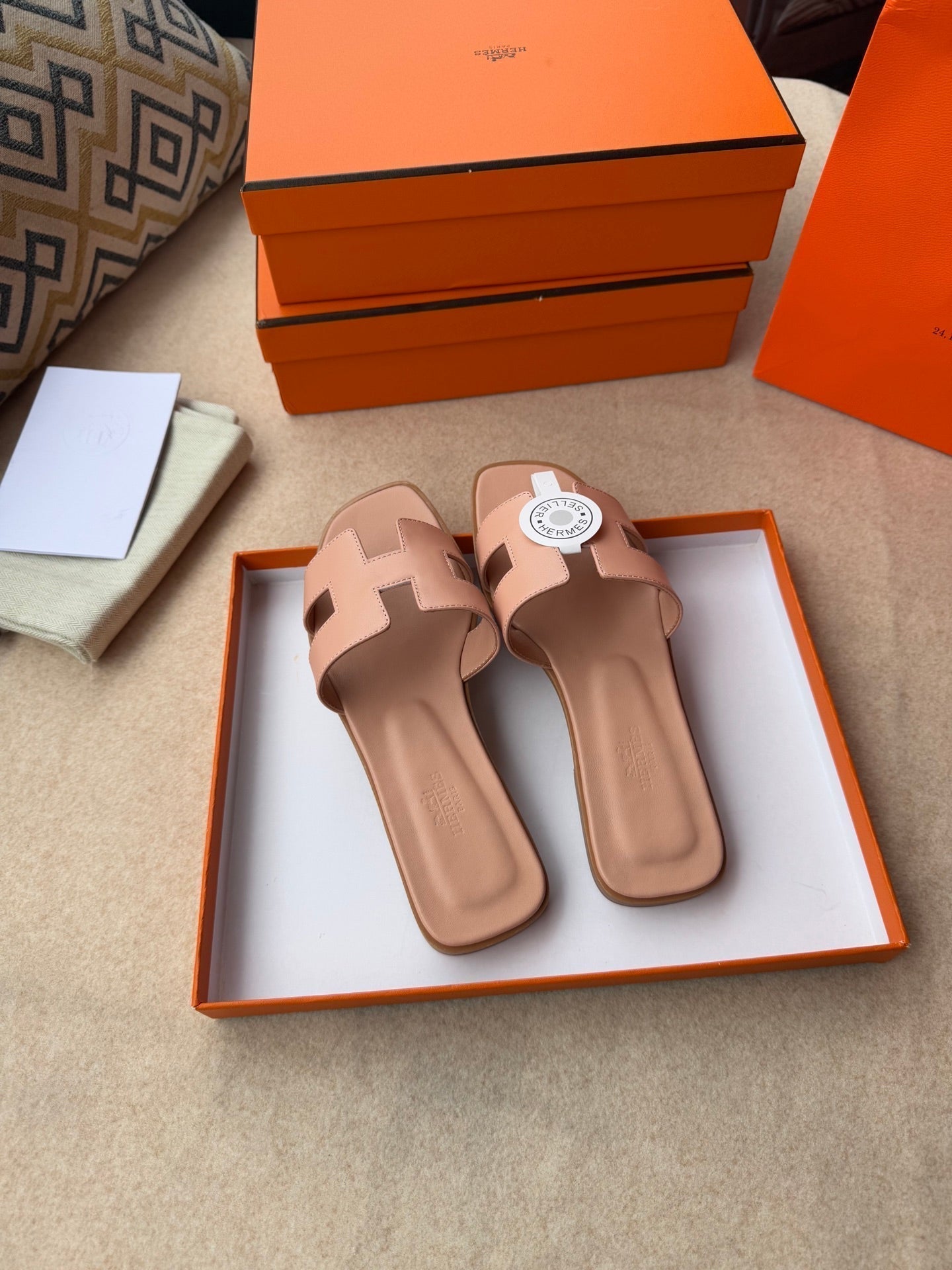HERMES 0RAN SANDALS IN PEACH PINK CALFSKIN