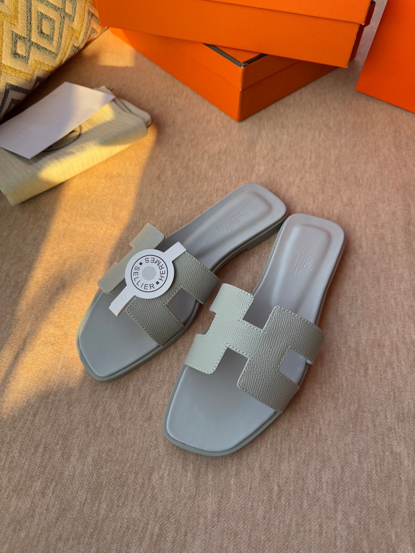 HERMES 0RAN SANDALS IN WARM GRAY CALFSKIN
