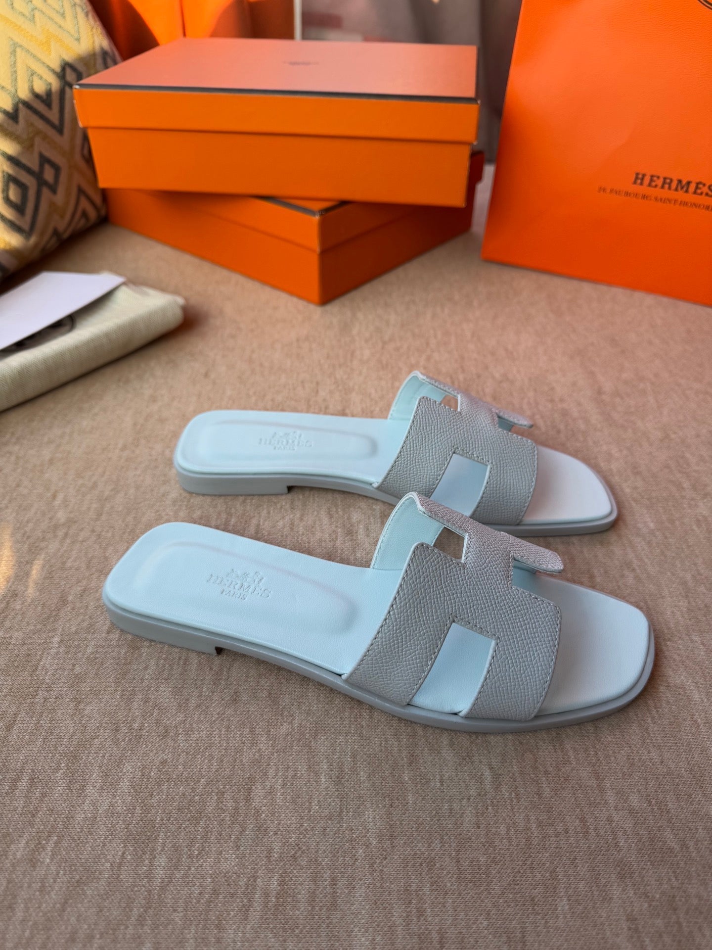 HERMES 0RAN SANDALS IN ICE BLUE CALFSKIN