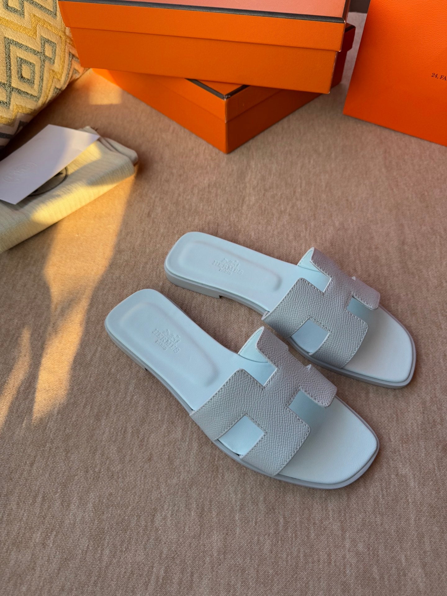 HERMES 0RAN SANDALS IN ICE BLUE CALFSKIN