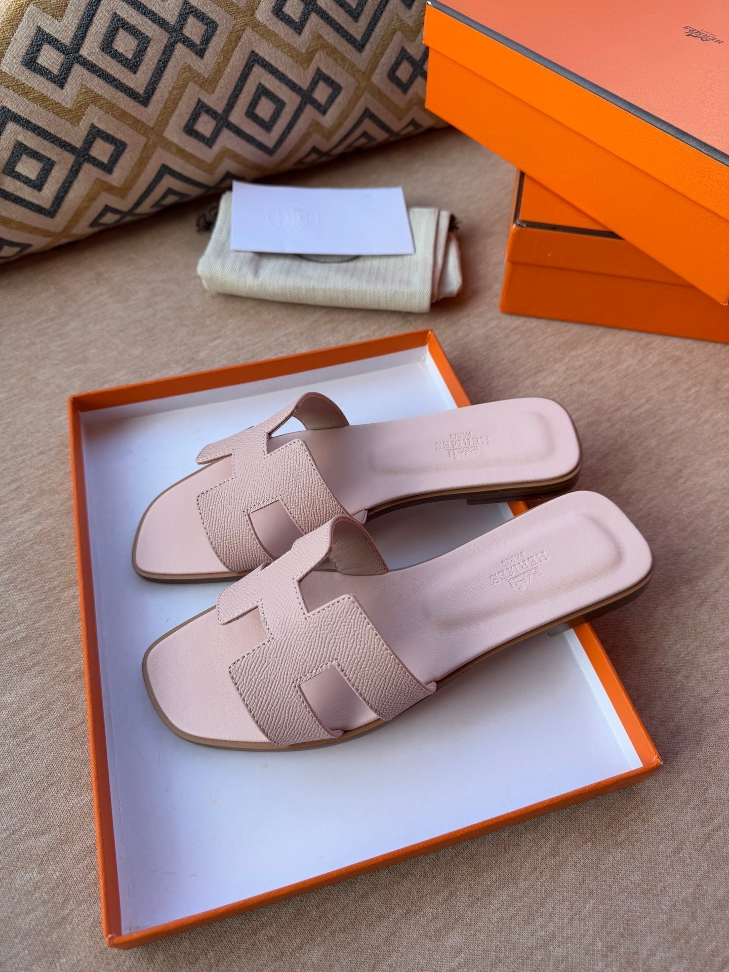 HERMES 0RAN SANDALS IN PASTEL PINK CALFSKIN