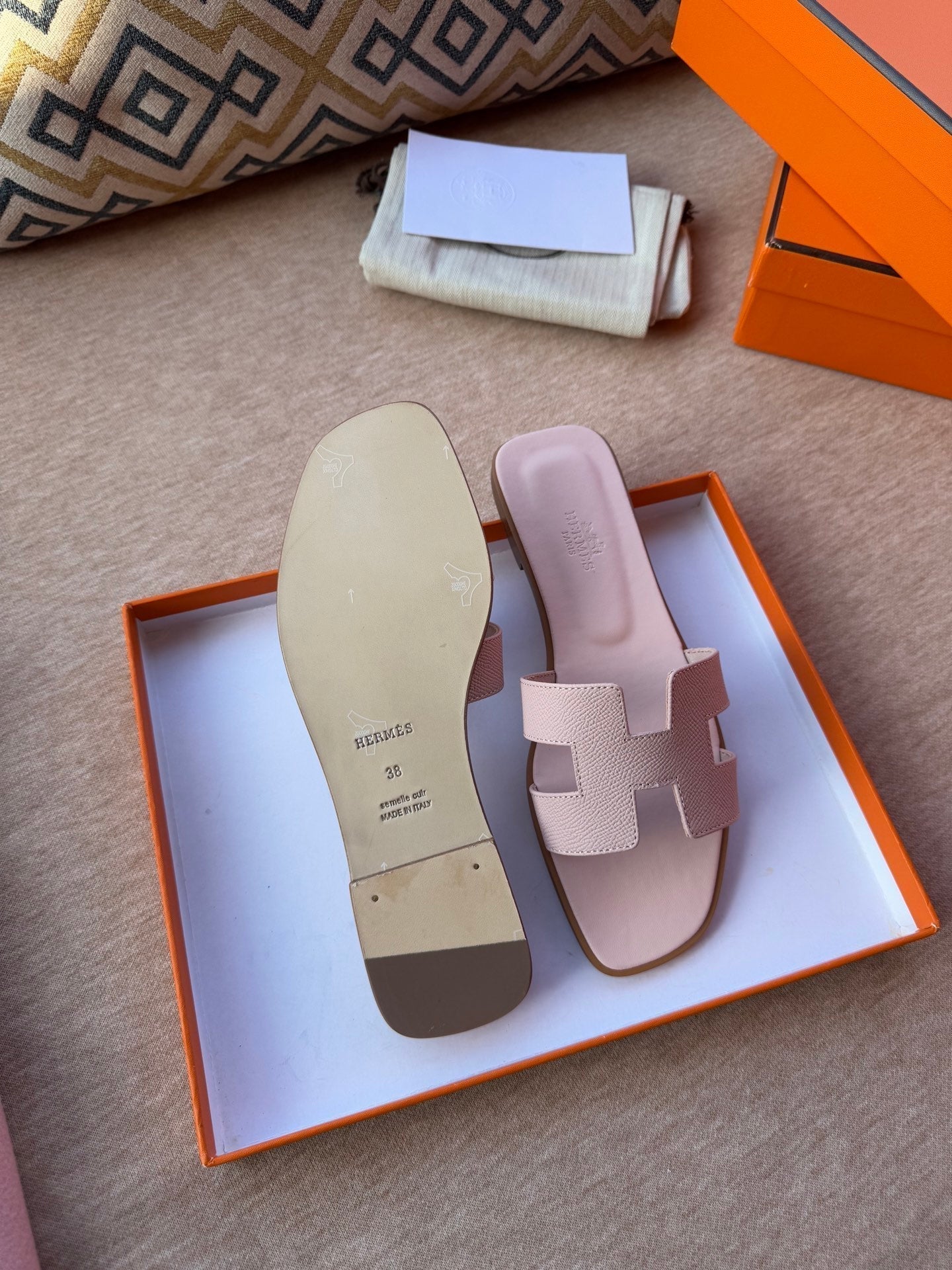HERMES 0RAN SANDALS IN PASTEL PINK CALFSKIN