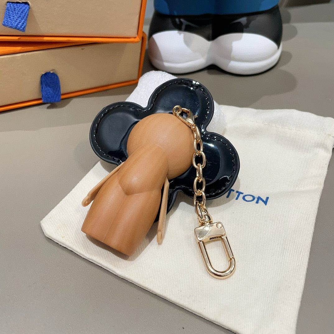 LOUIS VUITTON LV KEYCHAIN IN BLACK CALFSKIN AND WOOD