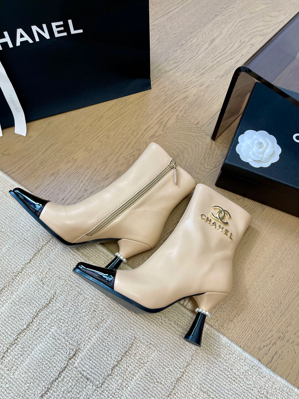 CHANEL BONGADE BOOTS IN BEIGE MIX BLACK CALFSKIN