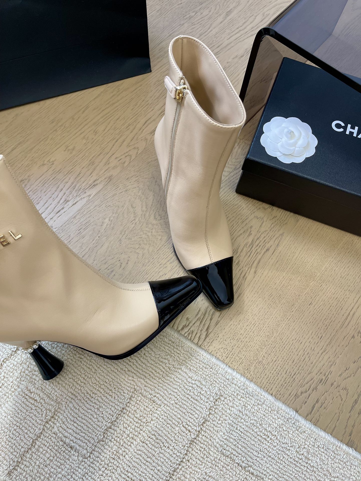 CHANEL BONGADE BOOTS IN BEIGE MIX BLACK CALFSKIN