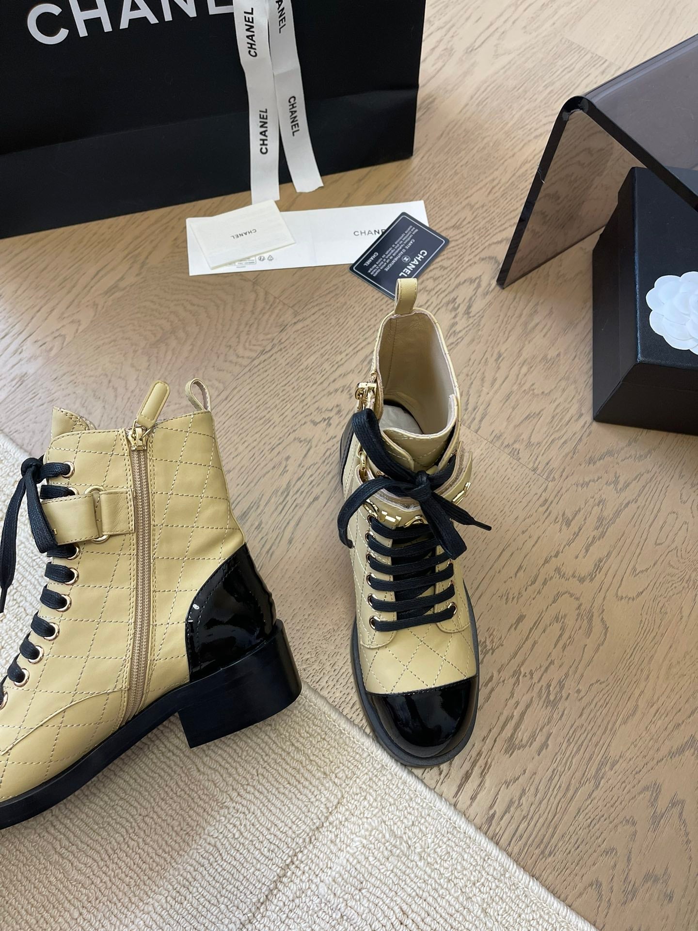 CHANEL ALPHABET MARTIN BOOTS IN FLAX YELLOW LAMBSKIN