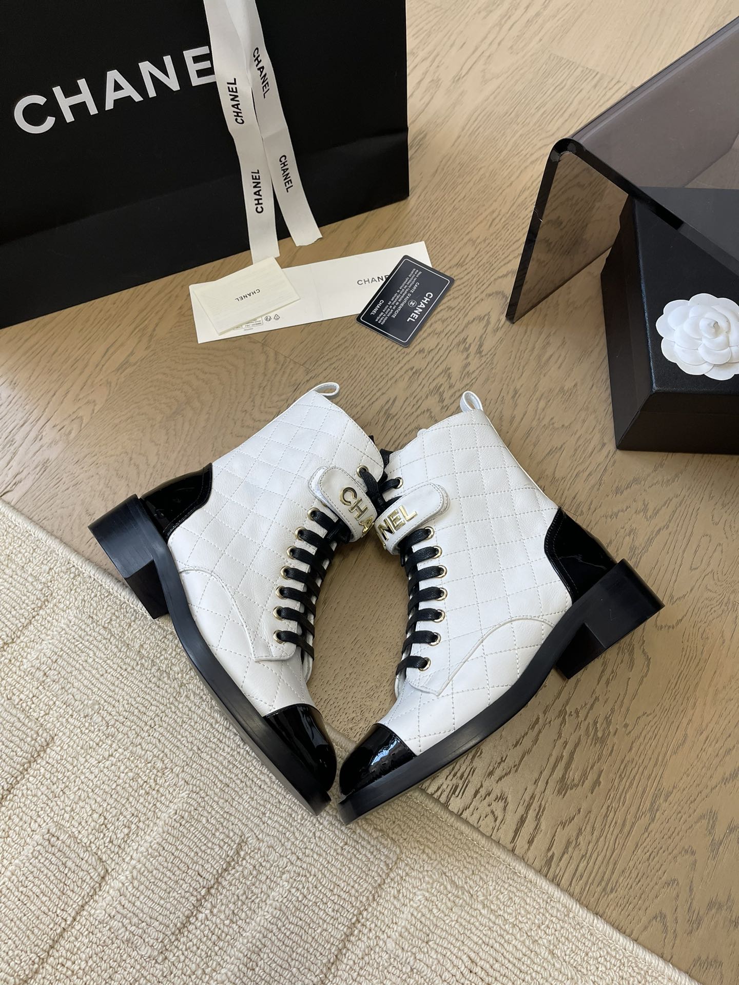 CHANEL ALPHABET MARTIN BOOTS IN WHITE LAMBSKIN