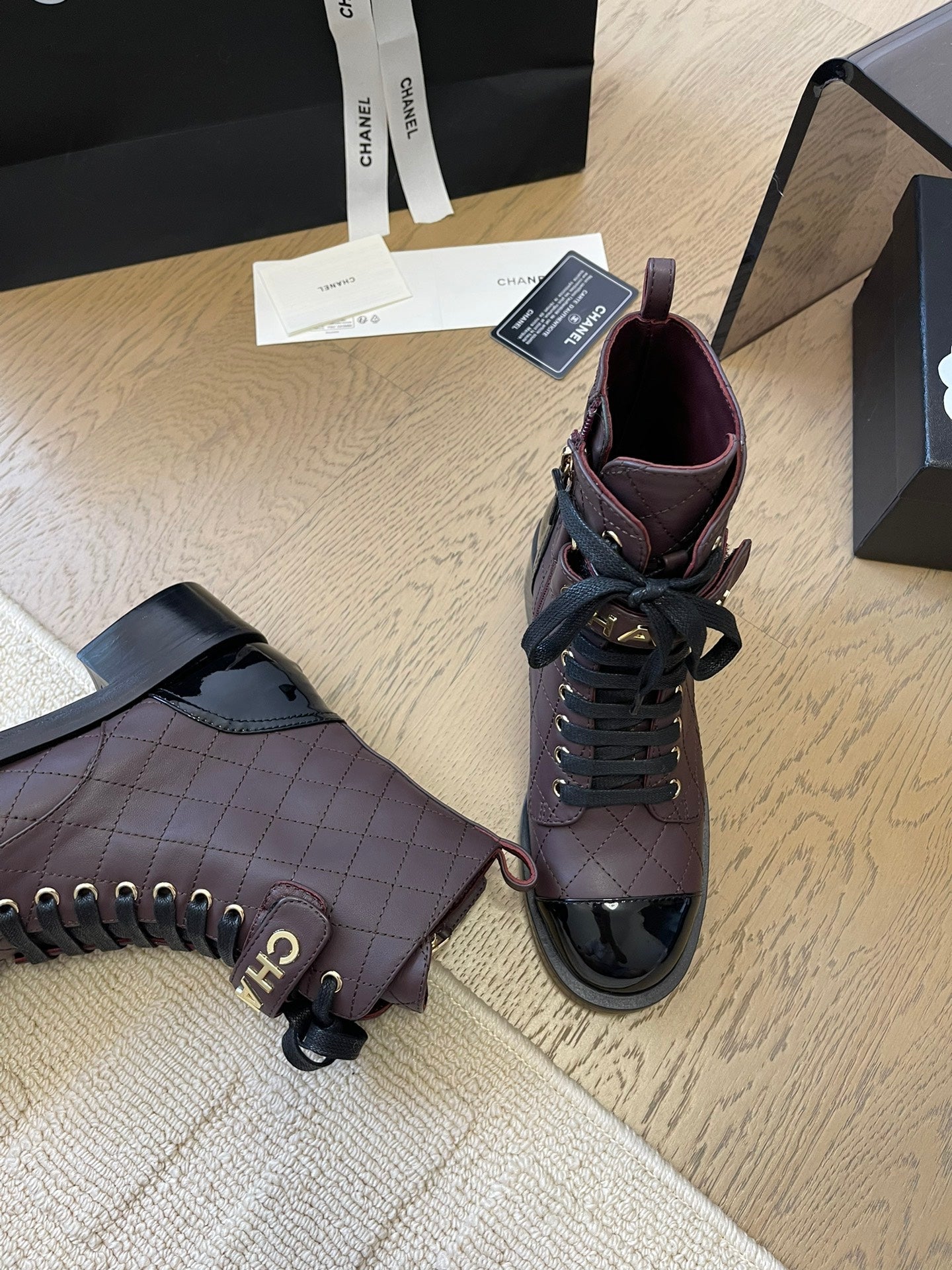 CHANEL ALPHABET MARTIN BOOTS IN BRUNETTE BROWN MIX BLACK LAMBSKIN