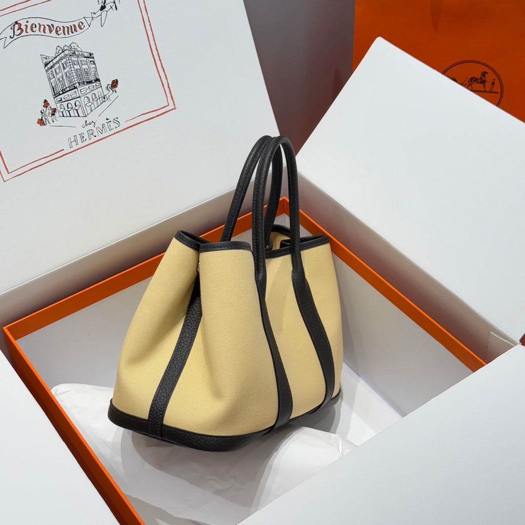 HERMES GARDEN PARTY 30CM IN DARK BEIGE TOILETS COTTON CANVAS AND BLACK CALFSKIN