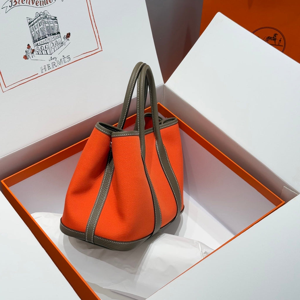 HERMES GARDEN PARTY 30CM IN ORANGE MINIMUM TOILETS COTTON CANVAS AND BROWN CALFSKIN