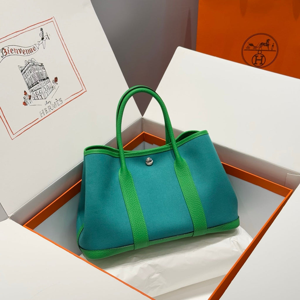 HERMES GARDEN PARTY 30CM IN CADMIUM GREEN TOILETS COTTON CANVAS AND GREEN CALFSKIN