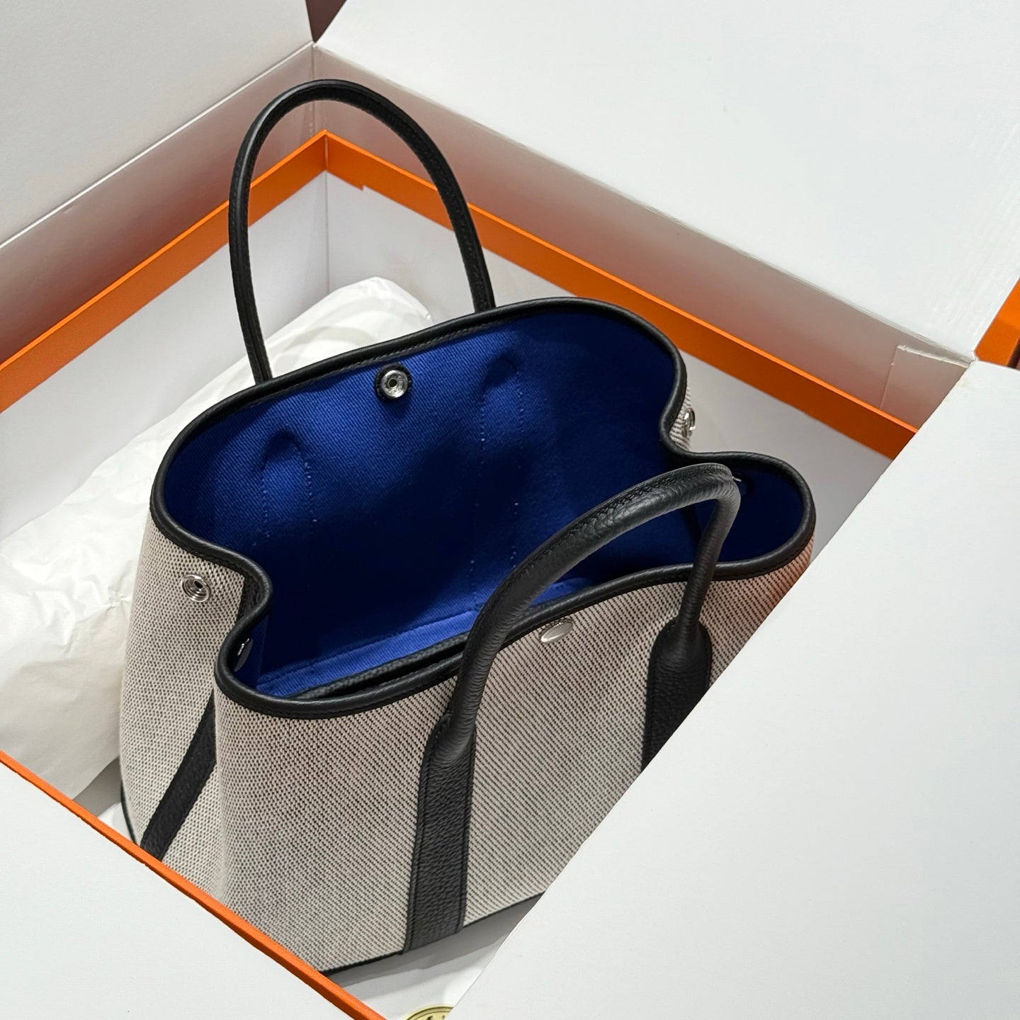 HERMES GARDEN PARTY 30CM IN WHITE TOILETS COTTON CANVAS AND BLACK CALFSKIN BLUE CANVAS ON SIDE OTHER